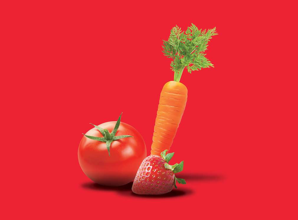 Ovocie a zelenina na červenom pozadí