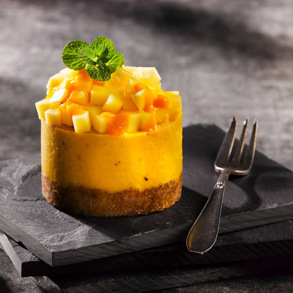Abbildung des Rezepts Cleane Mango-Cheesecake-Törtchen mit Kokos