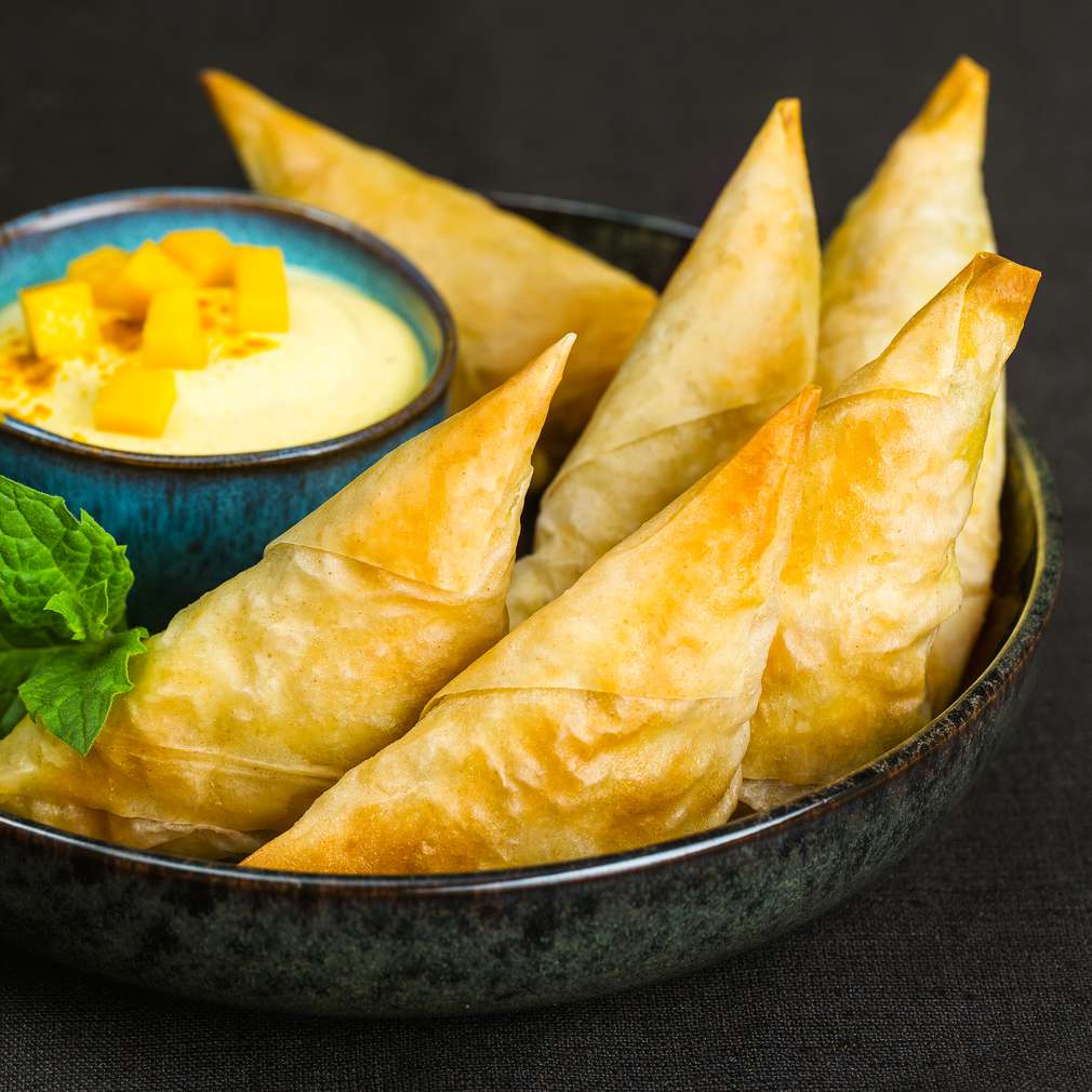 Abbildung des Rezepts Mango-Kokos-Samosas Abbildung des Rezepts Mango-Kokos-Samosas
