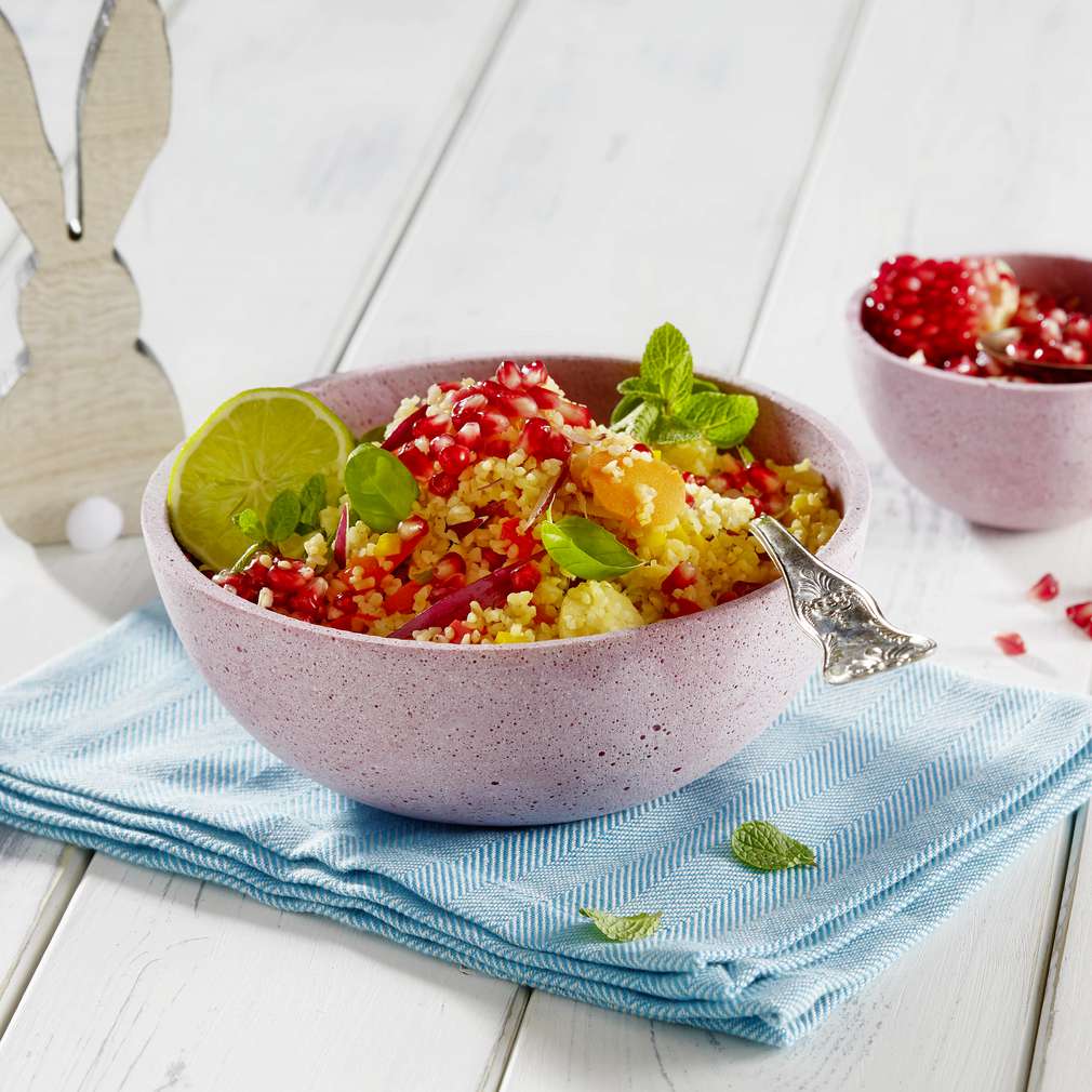Abbildung des Rezepts Lauwarmer Bulgur-Gemüsesalat mit Granatapfelkernen Abbildung des Rezepts Lauwarmer Bulgur-Gemüsesalat mit Granatapfelkernen