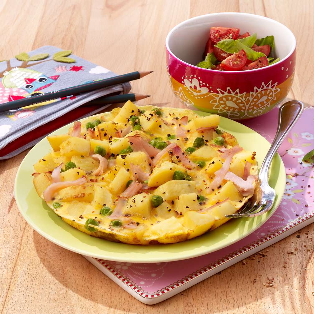Imaginea rețetei Tortilla cu mazăre și șuncă de pui Imaginea rețetei Tortilla cu mazăre și șuncă de pui