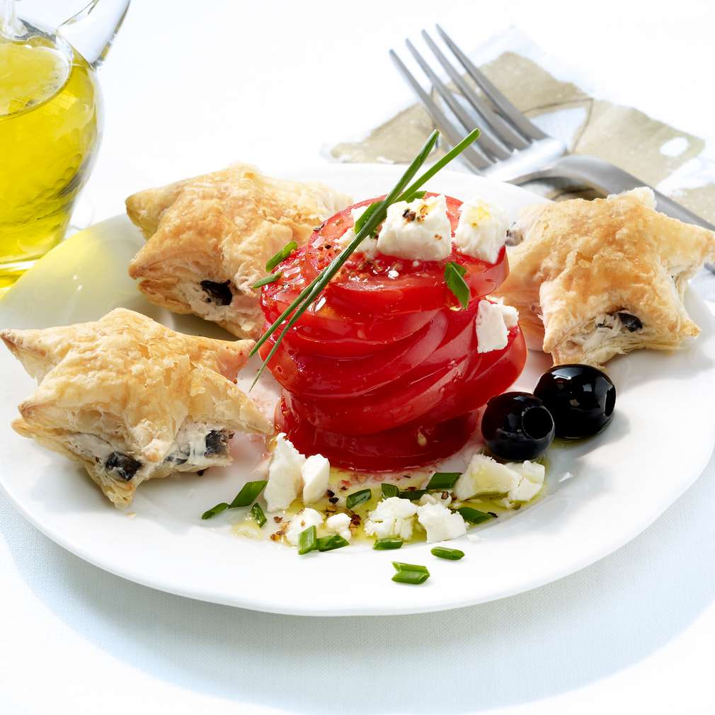 Abbildung des Rezepts Tomatensalat mit Olivensternen Abbildung des Rezepts Tomatensalat mit Olivensternen